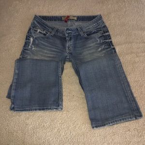 Women’s buckle jeans